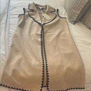 Elegant Tan Sleeveless jacket/cape with Black Trim